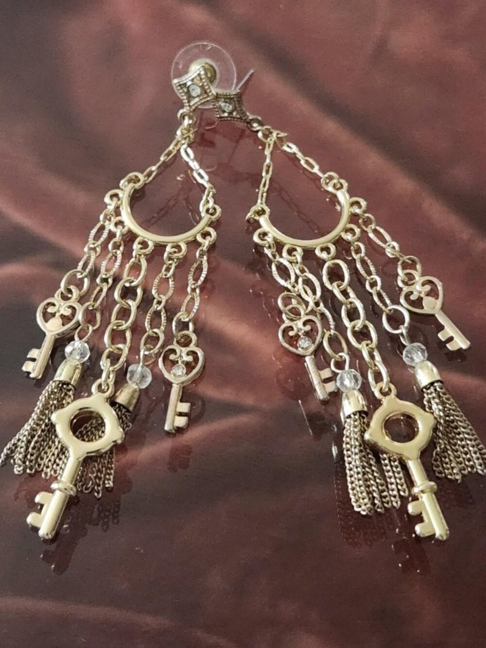 Mary Kay Gold-tone key earrings with dangling chains and tassels